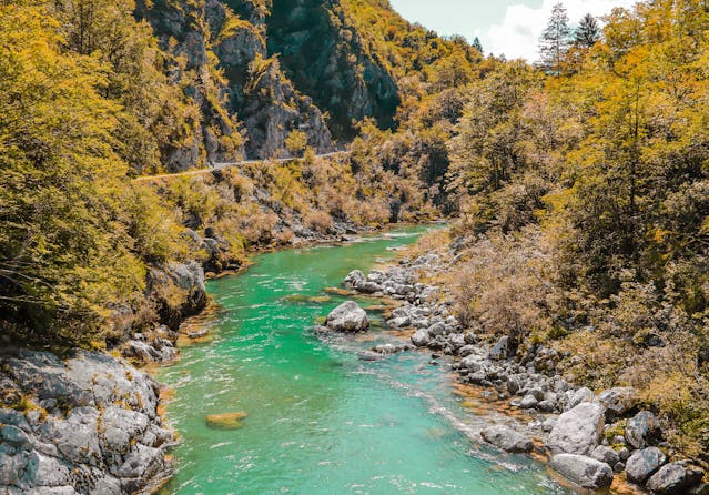 a river flowing through a mountain